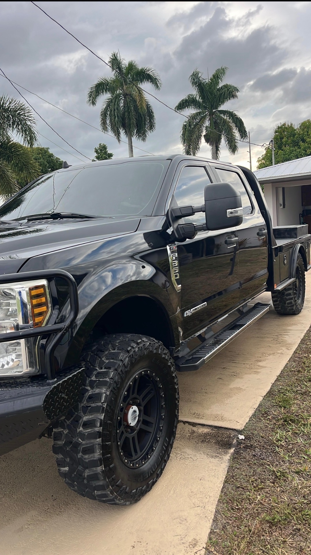 Black Ford F-350 with deep gloss after detailing